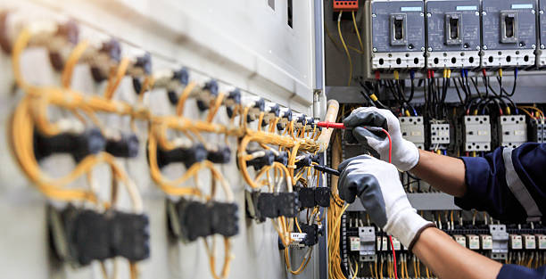 Professional Electrician technician working in Dix Hills, NY